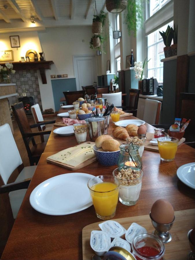סינט מארטנסדייק Bed & Brasserie Het Kosthuys מראה חיצוני תמונה